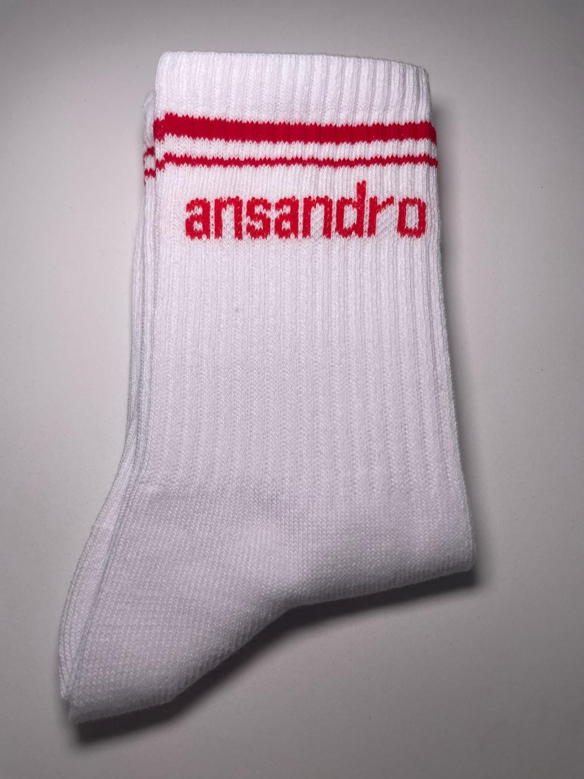 100% cotton branded socks for kids - soft, breathable, and durable design. Red text and red banding