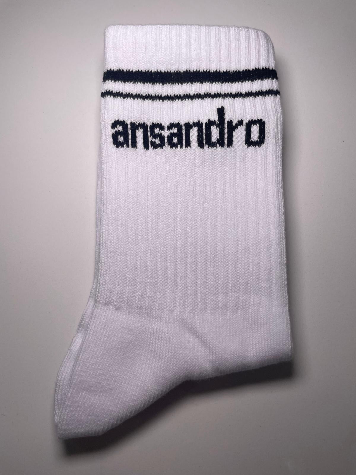 100% cotton branded socks for kids - soft, breathable, and durable design. Black text and black banding