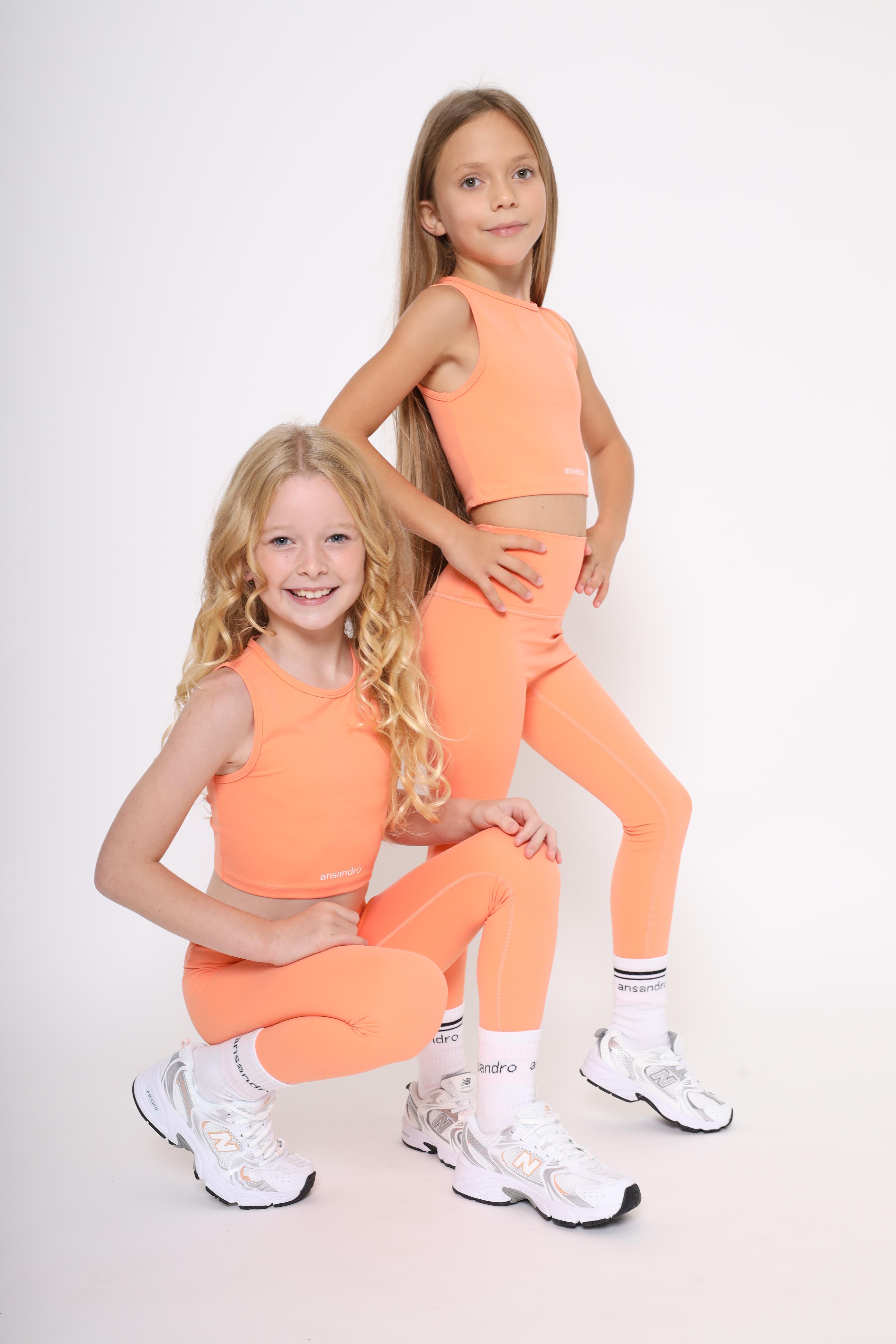 High-waisted leggings for active kids aged 5-14 - comfortable and versatile - orange with branded socks