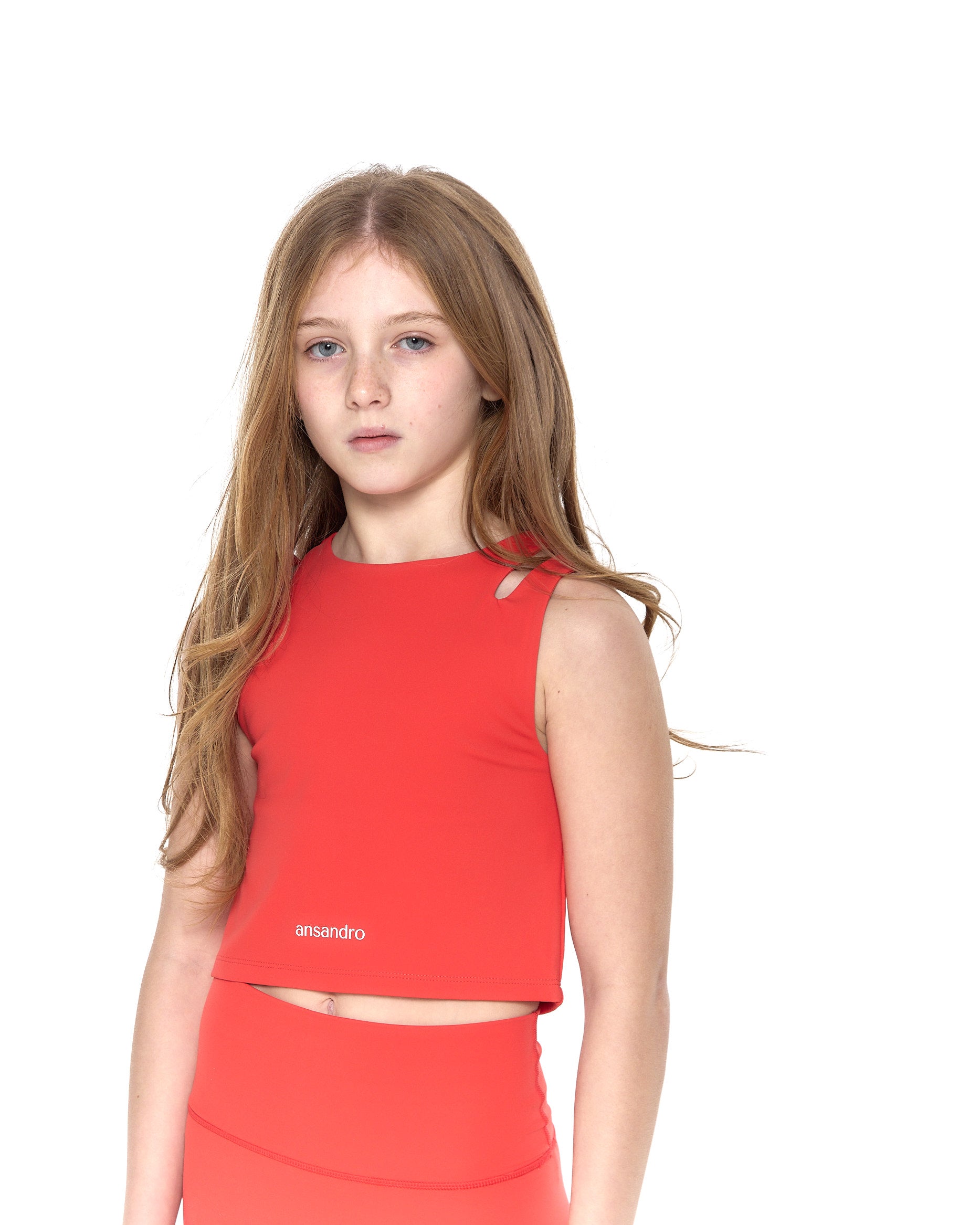 Two-strap cropped girls' tank top for sports, dance, and everyday wear - Red with matching high-waisted leggings.