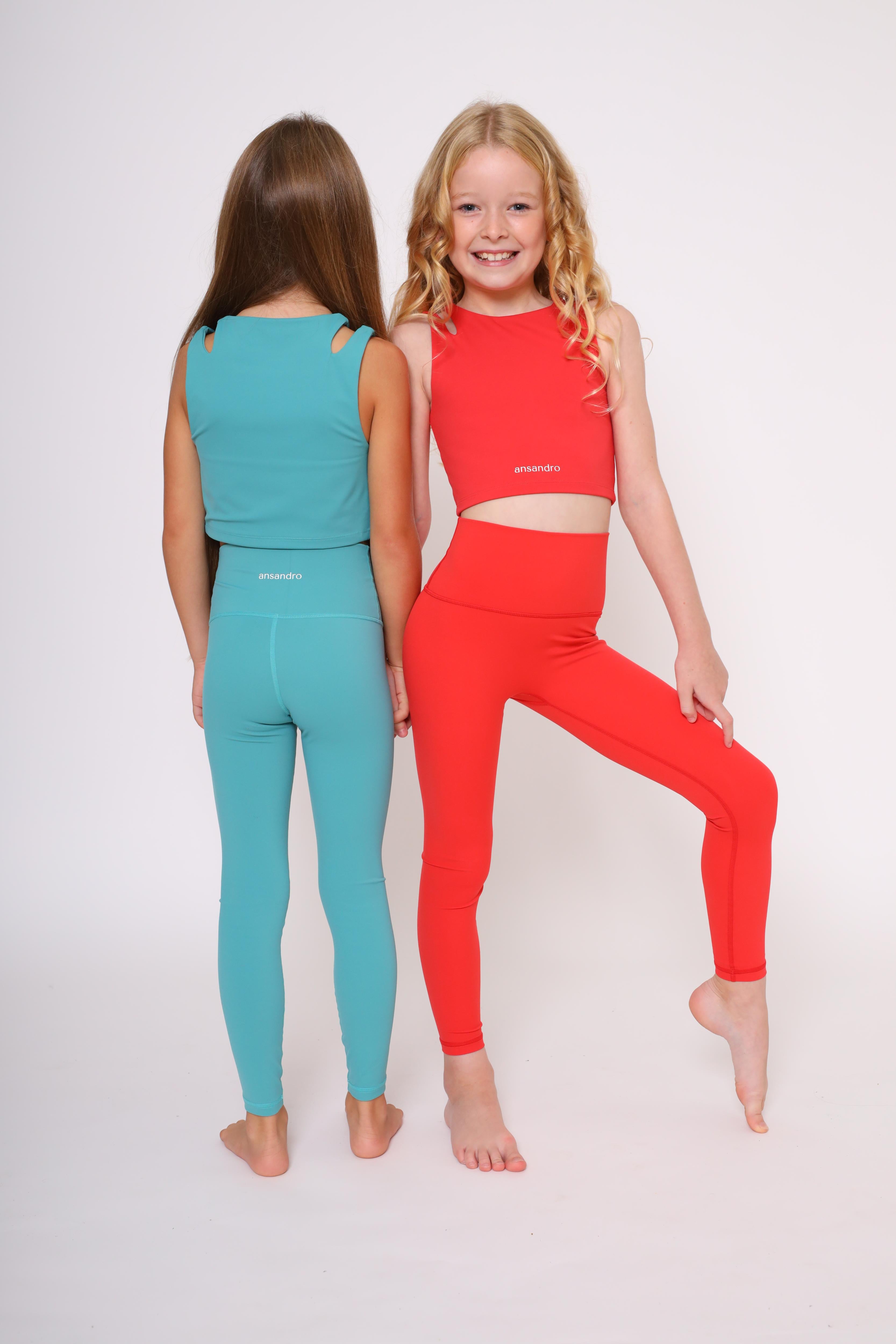 Two-strap cropped girls' tank top for sports, dance, and everyday wear - Red with matching high-waisted leggings.