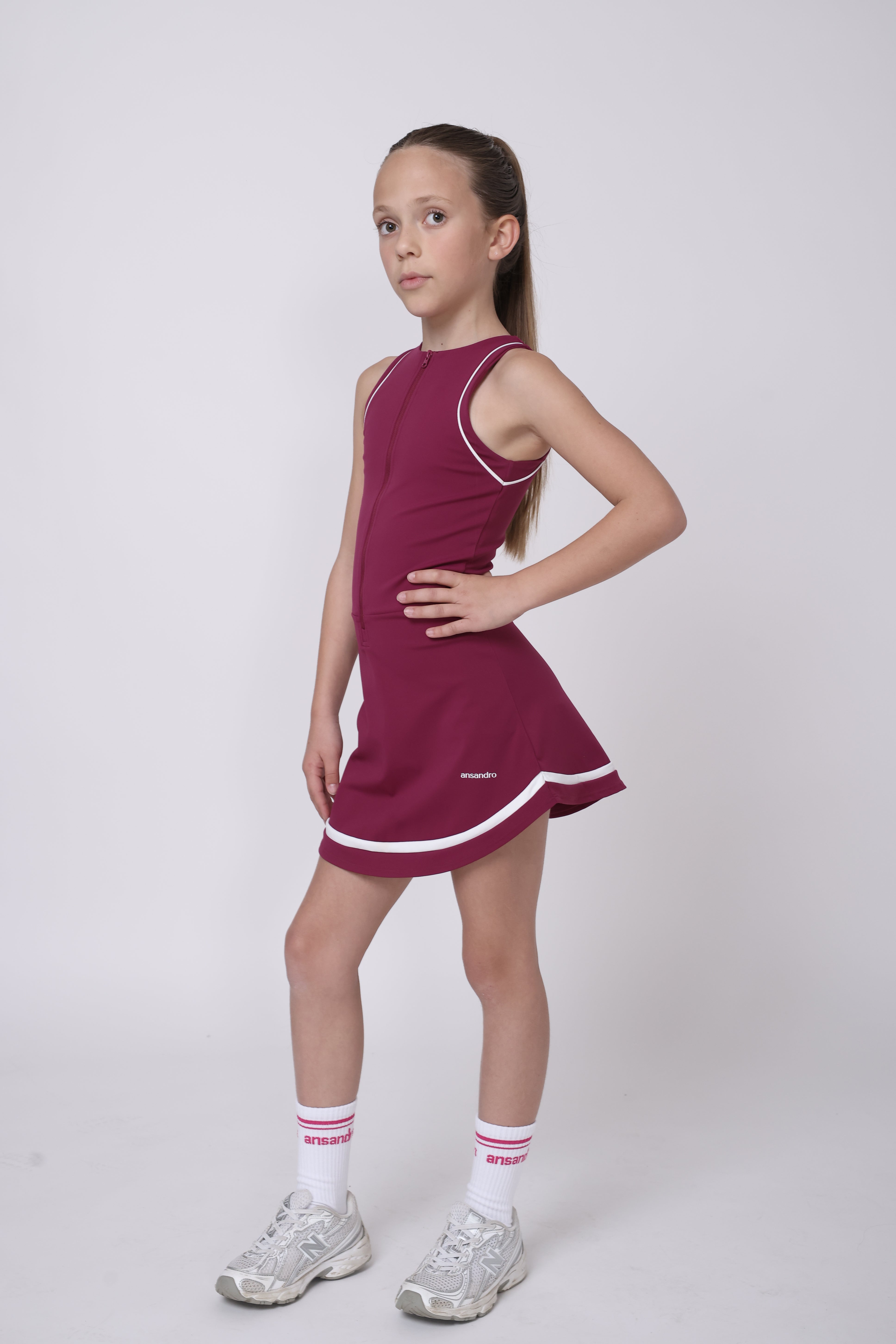 Side view of navy activewear skort dress for girls by Ansandro