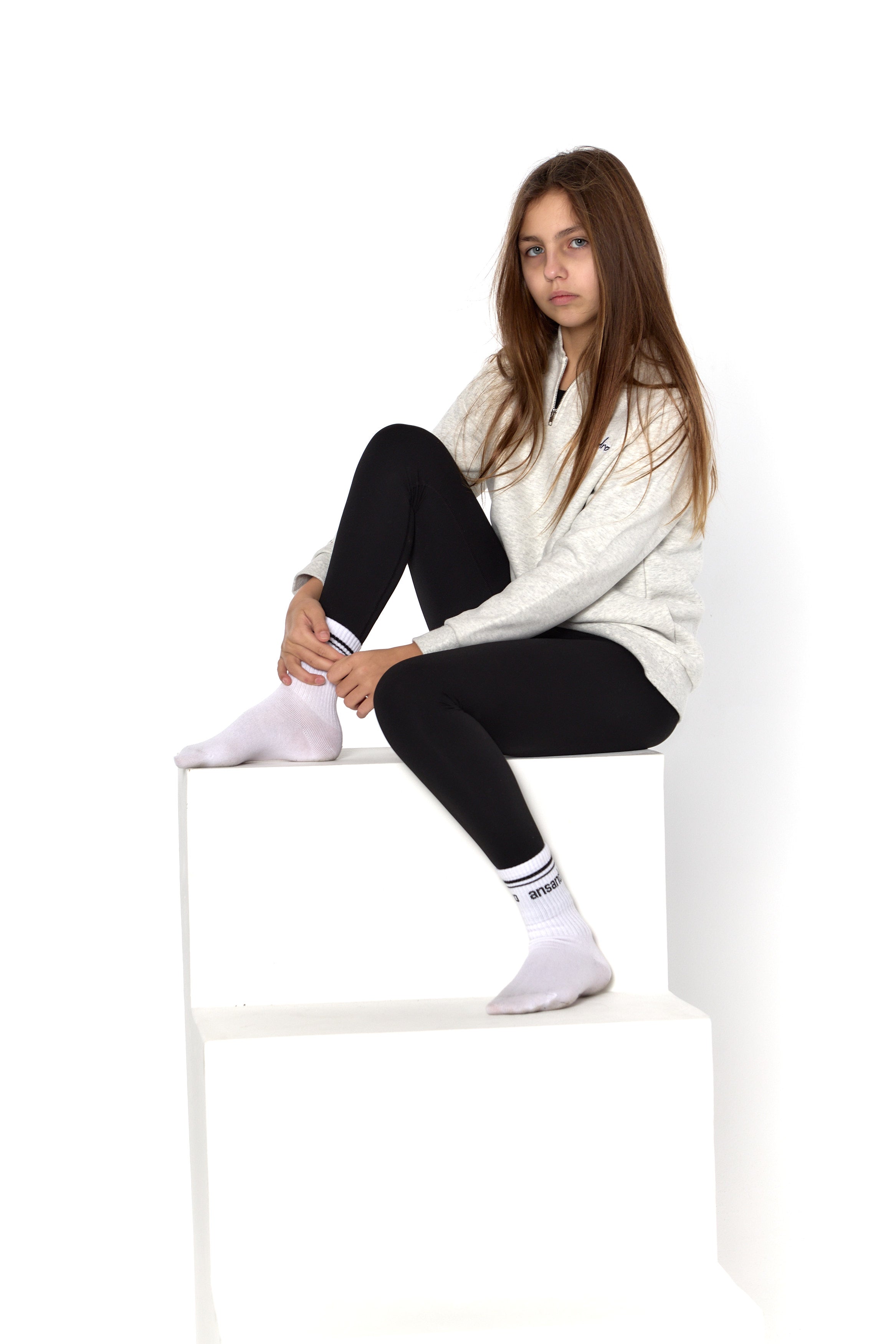 100% cotton marl grey zip sweatshirt for kids - premium activewear layer paired with our high-waisted black leggings and branded socks