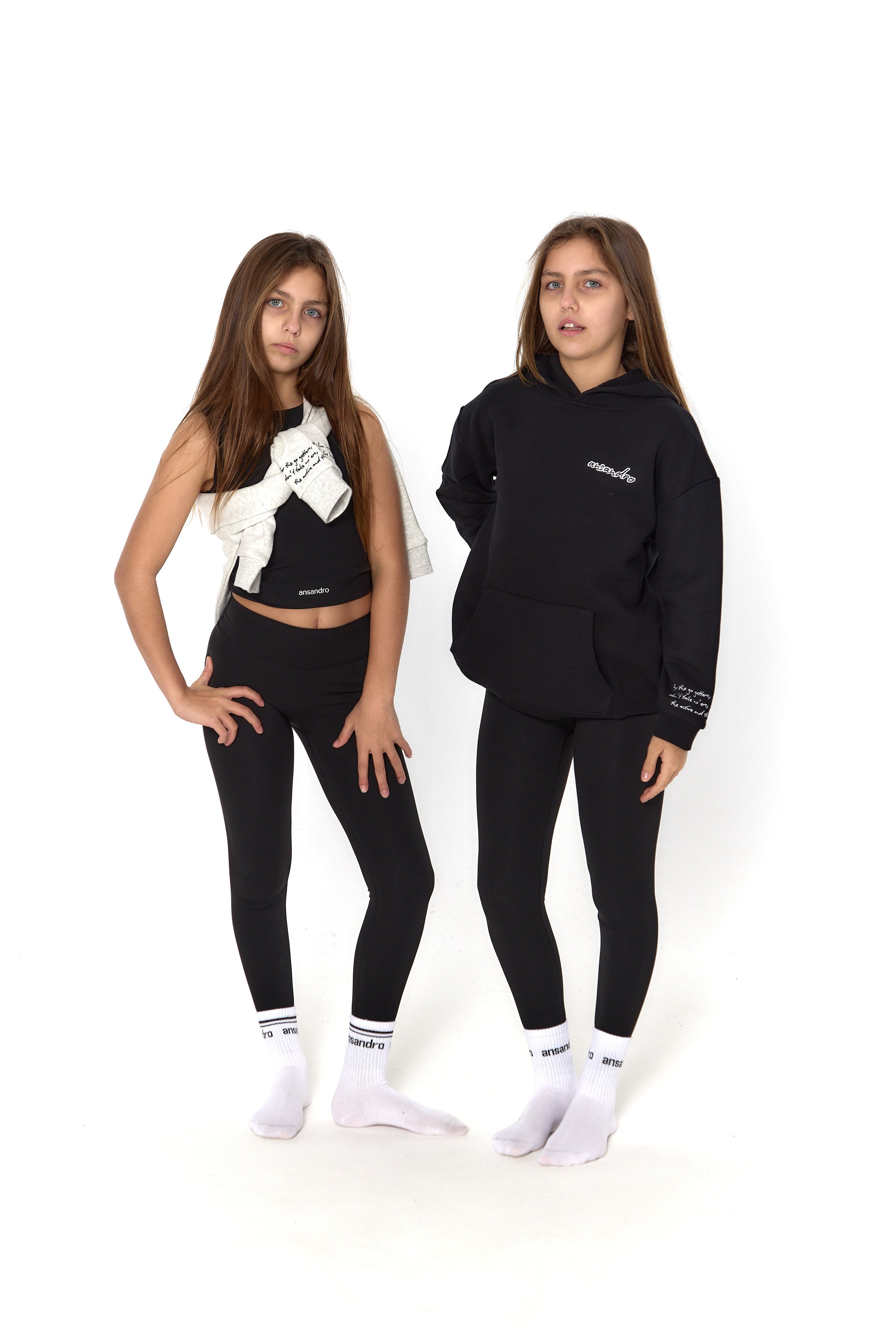 Black high-waisted leggings for kids - premium activewear for comfort and style.  Girls athleisure.