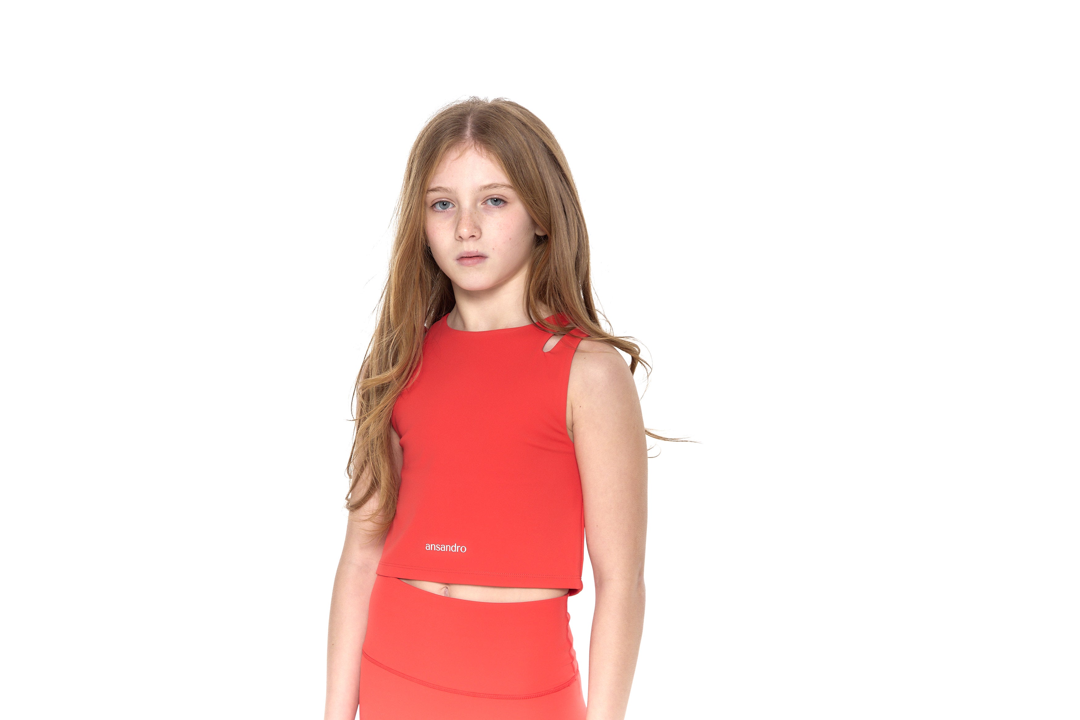Two-strap cropped girls' tank top for sports, dance, and everyday wear - Red with matching high-waisted leggings.