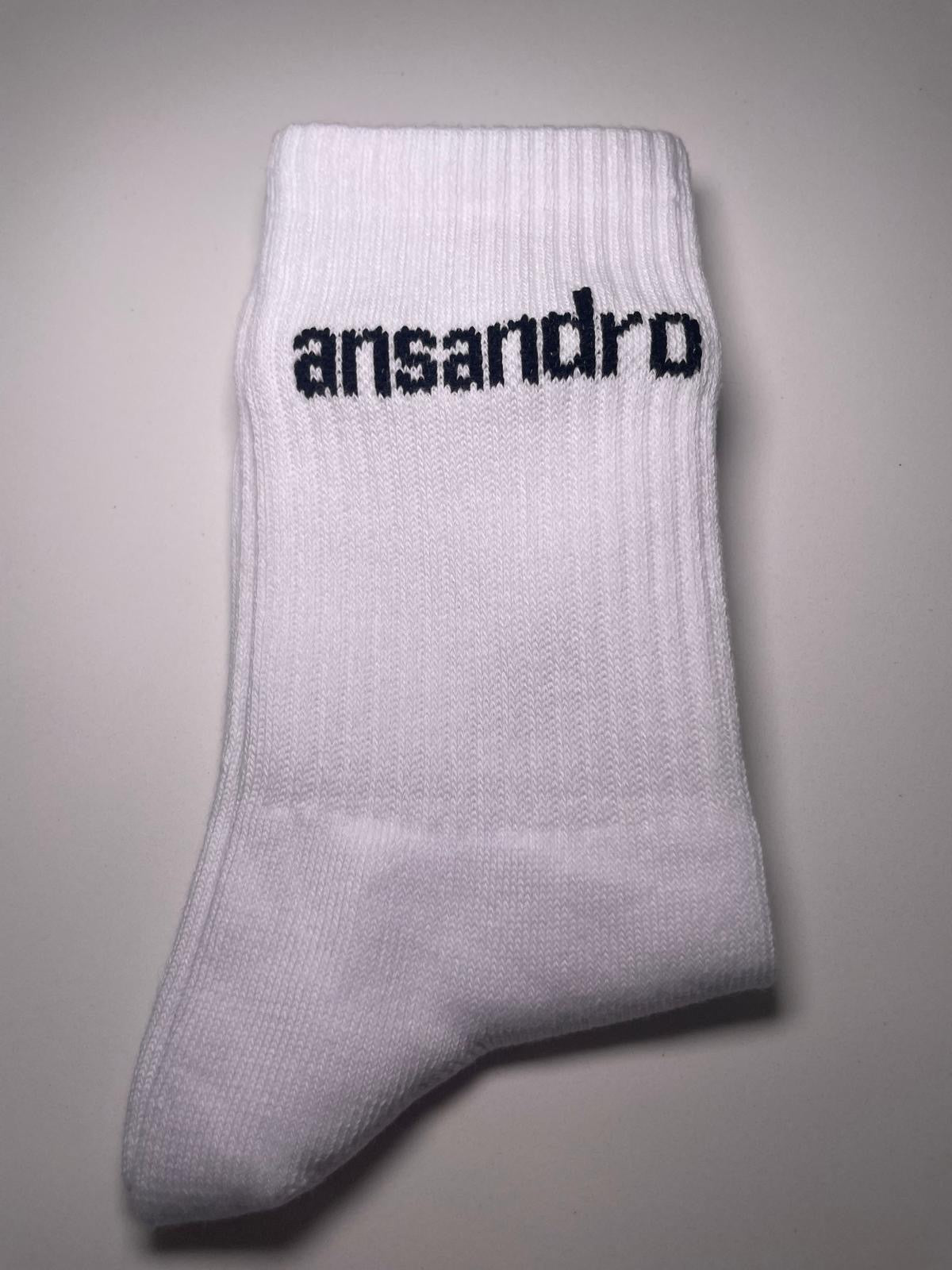 100% cotton branded socks with black text